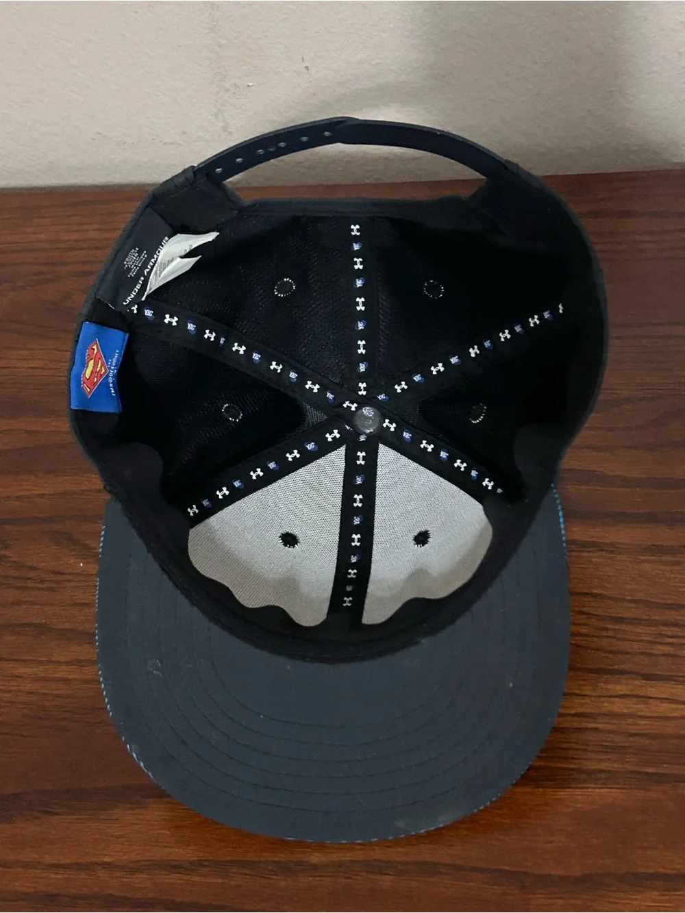 Under Armour Superman Kids Black Snapback Hat with Blue Patterned Brim